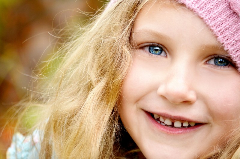 Child receiving frenectomy treatment