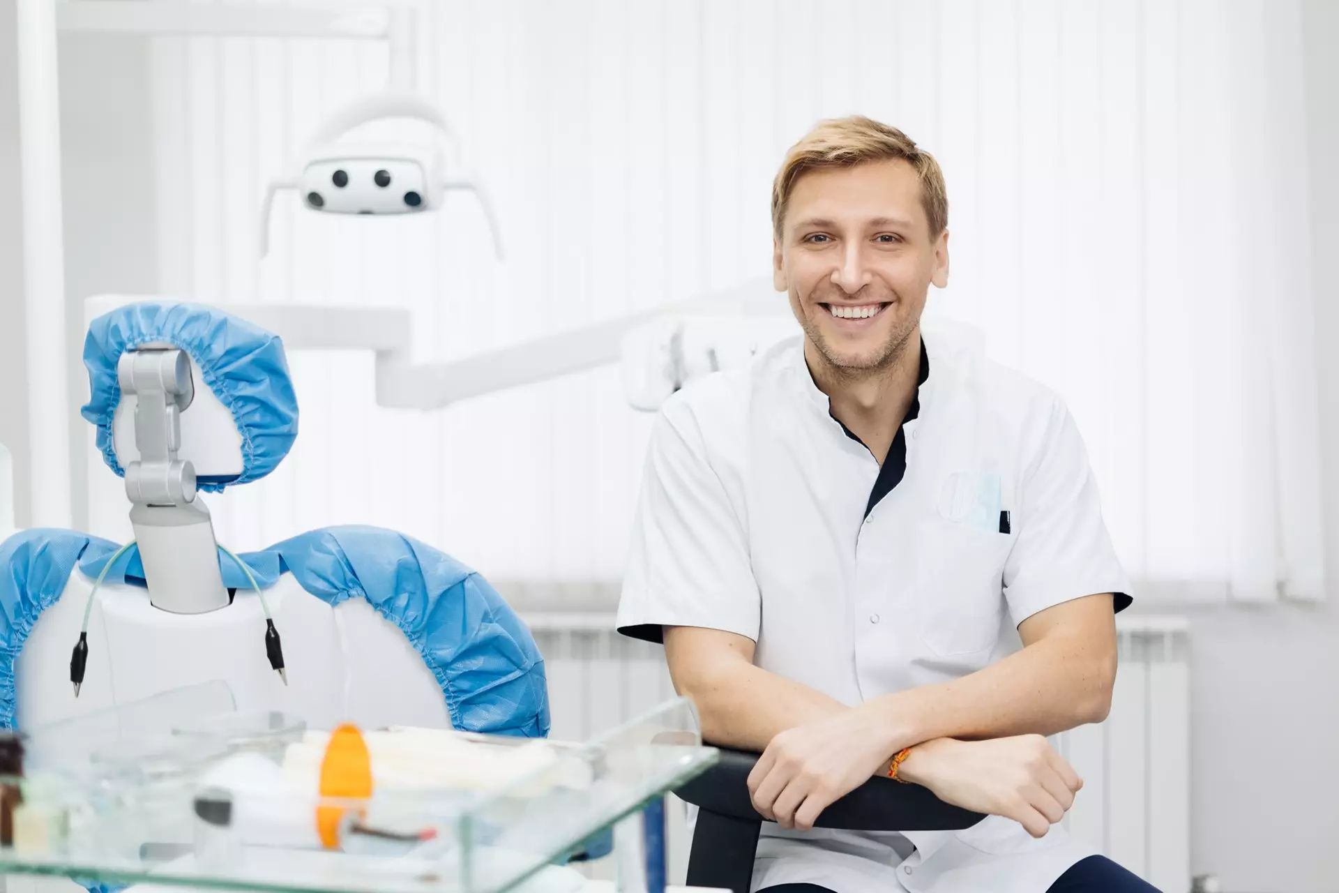 Smiling dentist in modern dental office